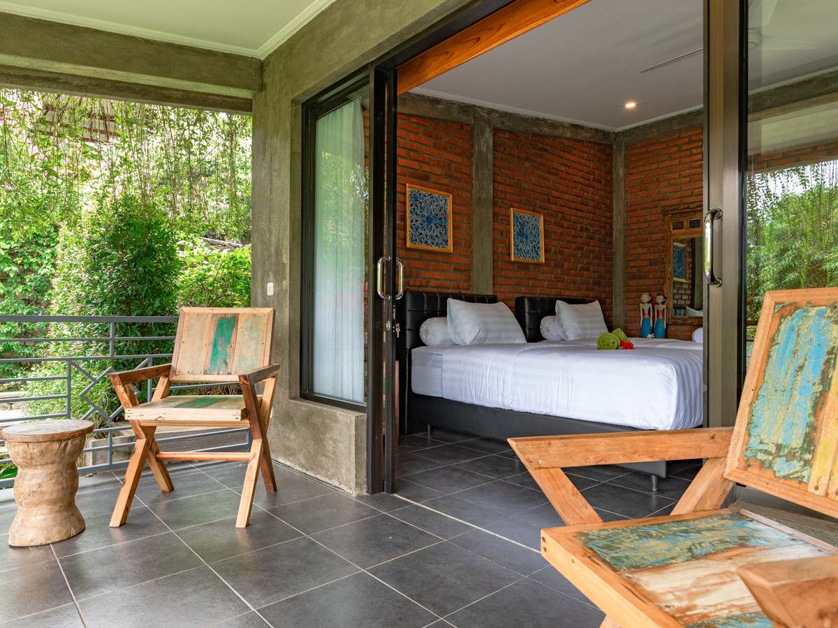 Jungle Room Bagera at Alamanda, with twin beds opening onto a private balcony
